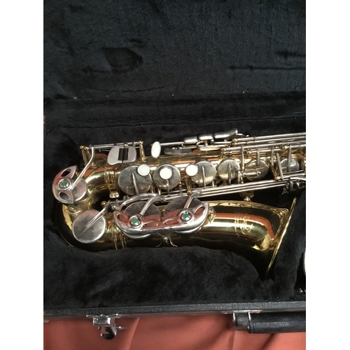 40 - Elkhart Vincent Bach international LTD brass saxophone with mouth pieces & case in fantastic conditi... 