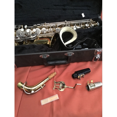 40 - Elkhart Vincent Bach international LTD brass saxophone with mouth pieces & case in fantastic conditi... 