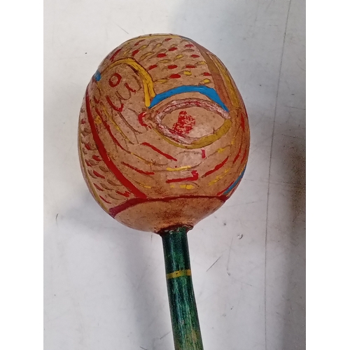 254 - 3 maracas. One pair smaller than a single large one. Look hand painted with great detail