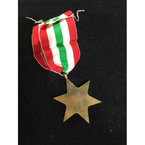 67 - WWII The Italy star with ribbon - un-named as issued