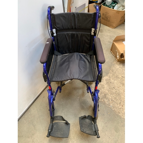 221 - Push along wheel chair in tidy condition