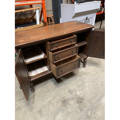 228 - Long oak sideboard - 1.3m - tidy condition