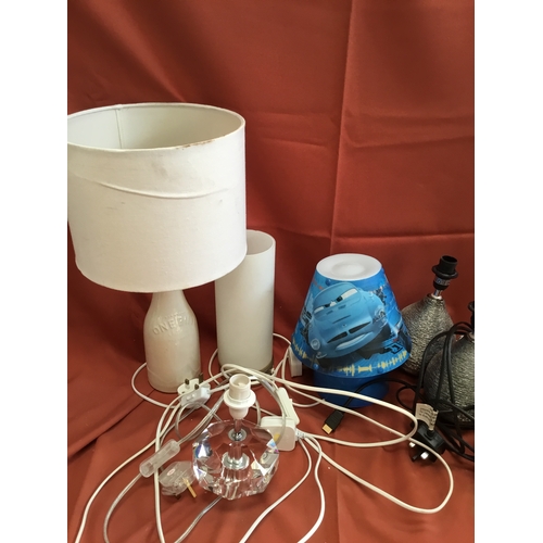 232 - Quantity of lighting inc one pint ceramic vase, brass style, matching silver pair & more