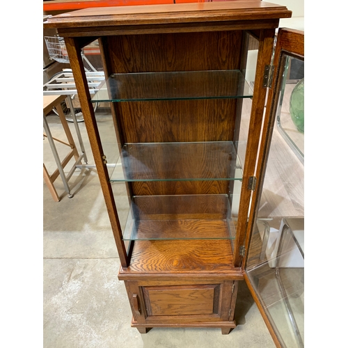 233 - Oak glazed & shelved display cabinet - 5f tall - very clean condition