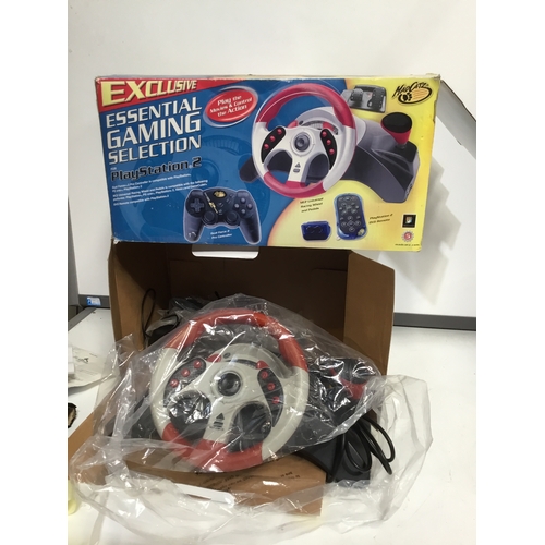 481 - Madcats Exclusive essential gaming selection for playstation 2 steering wheel and pedals in box