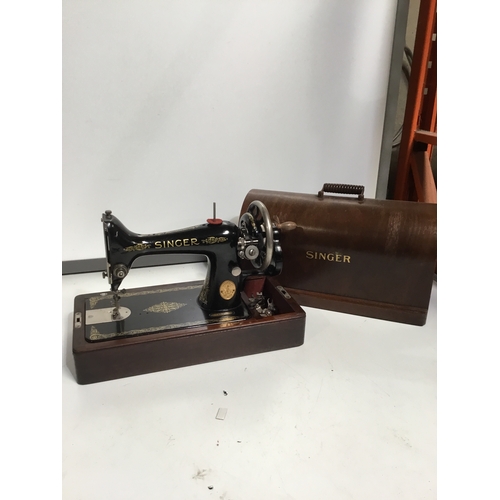 482 - Singer sewing machine with wooden case