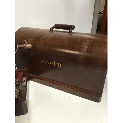 482 - Singer sewing machine with wooden case