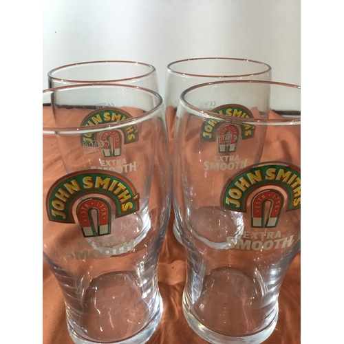 374 - Box of Eighteen John Smith Pint Glasses