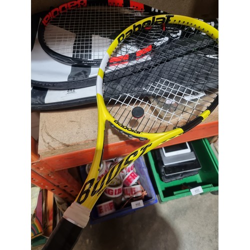 442 - Two Babolot tennis rackets & 2 sets of tennis balls evoke 105 and Boost A excellent condition