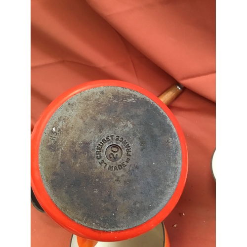 40 - Le Creuset burnt orange cast iron set of pan inc number 16, 18 & 20 saucepans & frying pan 26