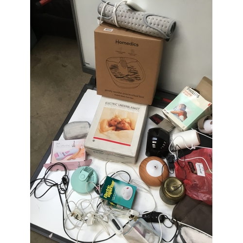 56 - Large mixed lot inc boxed foot spa, heated blanket & much more