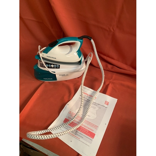 57 - Morphy Richards steam iron with manual
