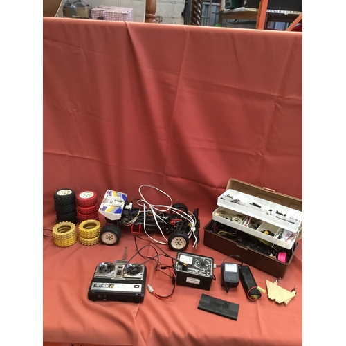 66 - Futaba FP-S148 remote control vehicle with lots of accessories in wheels, controller & box of all pa... 