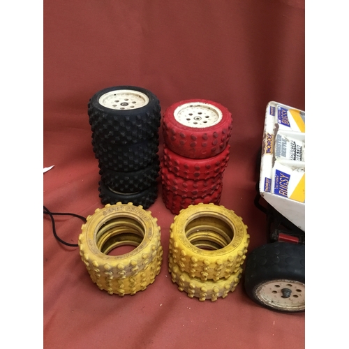 66 - Futaba FP-S148 remote control vehicle with lots of accessories in wheels, controller & box of all pa... 