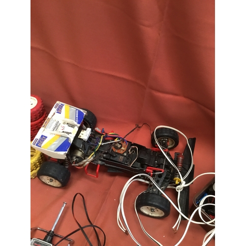 66 - Futaba FP-S148 remote control vehicle with lots of accessories in wheels, controller & box of all pa... 