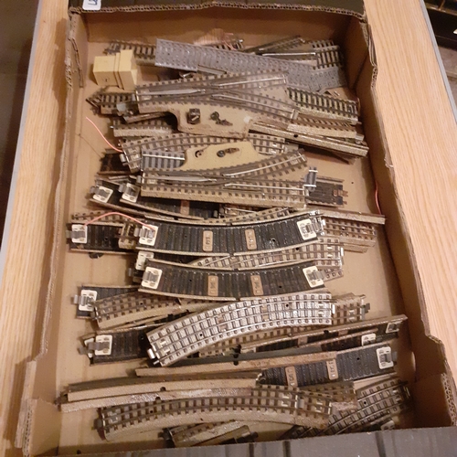 41A - Large quantity of model railway track.  Over 50 pieces. Largely undamaged. Light rusting on parts