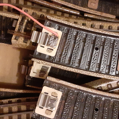 41A - Large quantity of model railway track.  Over 50 pieces. Largely undamaged. Light rusting on parts