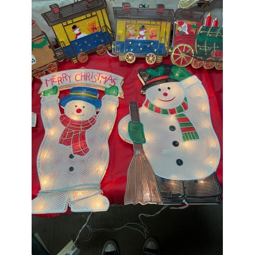 11 - Light up window decorations - snow man & train carriage