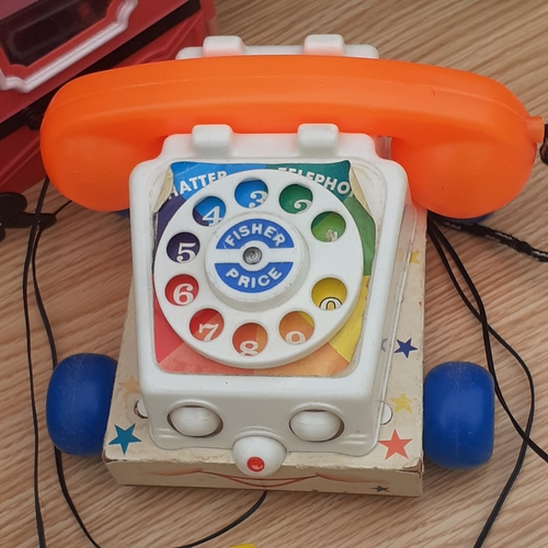 13 - Children's toys. Barbie wardrobe,  Ninja turtle, vintage doll and pull along train and Fisher Price ... 