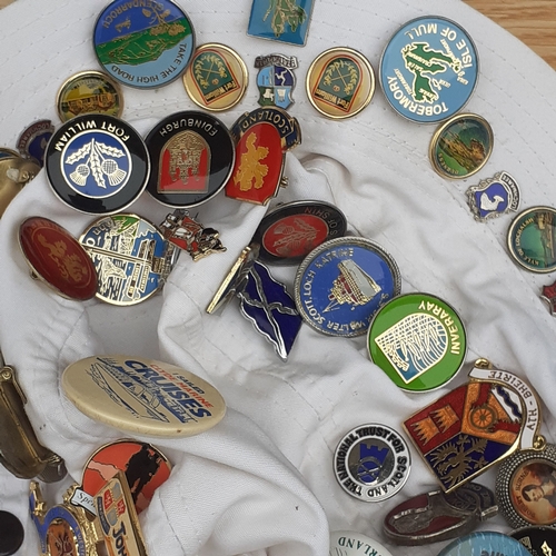 16 - 2 hats with one and a bit covered in various collections pin badges. Lots travel related in overall ... 