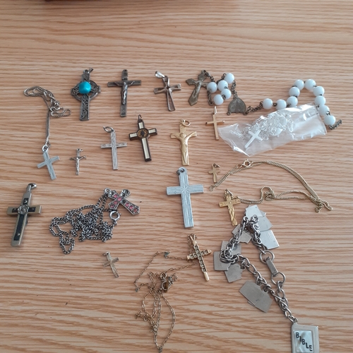 2 - An eye-catching wooden trinket box containing a number of religious related jewellery items includin... 