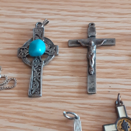 2 - An eye-catching wooden trinket box containing a number of religious related jewellery items includin... 