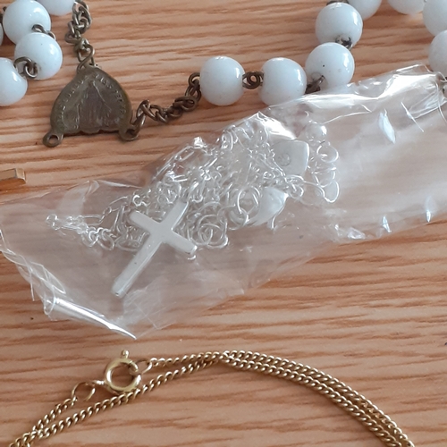 2 - An eye-catching wooden trinket box containing a number of religious related jewellery items includin... 