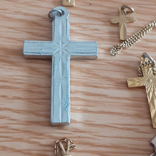 2 - An eye-catching wooden trinket box containing a number of religious related jewellery items includin... 