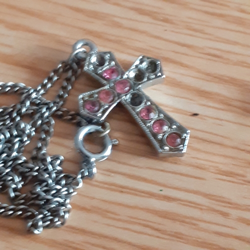 2 - An eye-catching wooden trinket box containing a number of religious related jewellery items includin... 