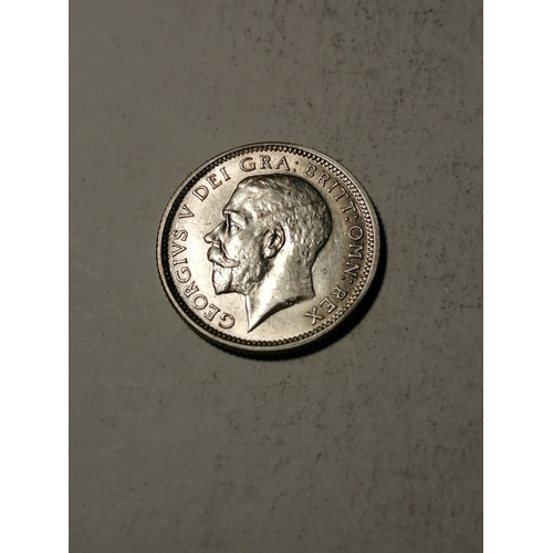 28A - COINS : 1925 sixpence in extremely fine condition or better