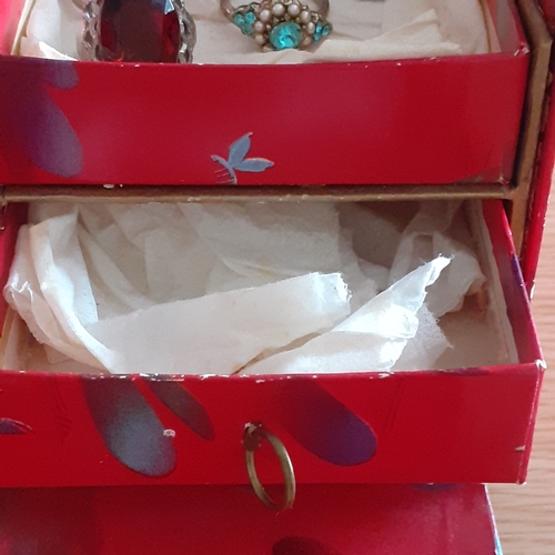 7 - Jewellery box with various costume rings and earrings with some eye-catching stones. All complete wi... 