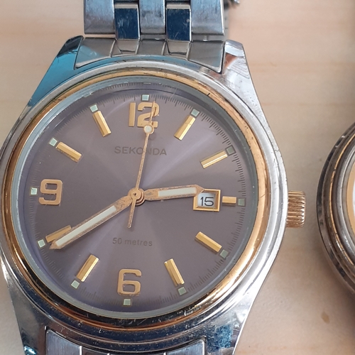 10 - Sekonda watch (boxed) plus a pulsar watch. Stainless Steel bracelets. Good used condition. Both not ... 