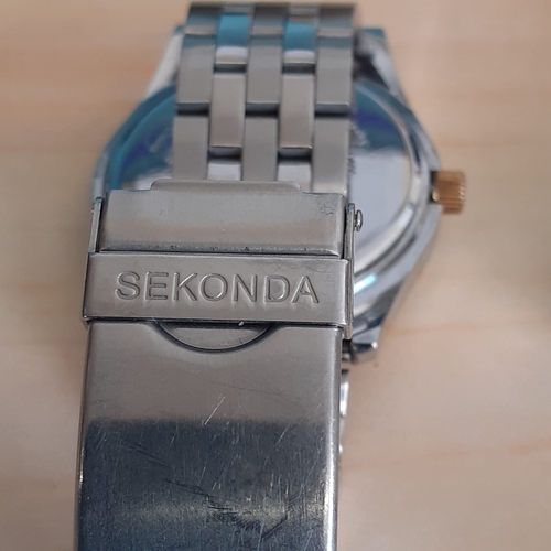 10 - Sekonda watch (boxed) plus a pulsar watch. Stainless Steel bracelets. Good used condition. Both not ... 