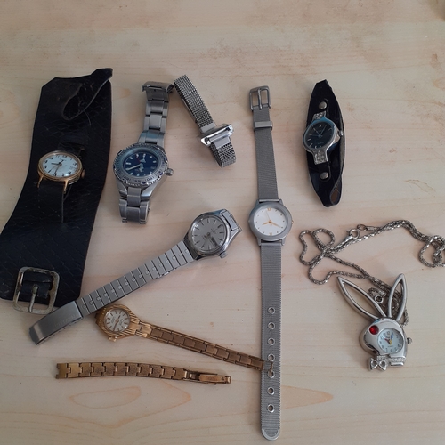 12 - Mixed watch lot. Includes playboy bunny on chain which is working and the rest are sold as spares or... 