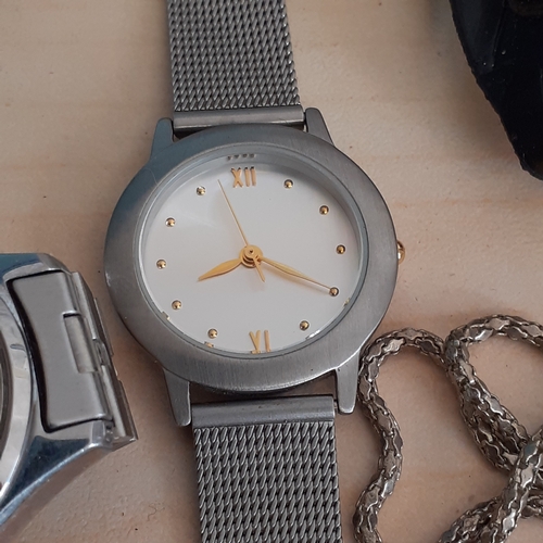 12 - Mixed watch lot. Includes playboy bunny on chain which is working and the rest are sold as spares or... 