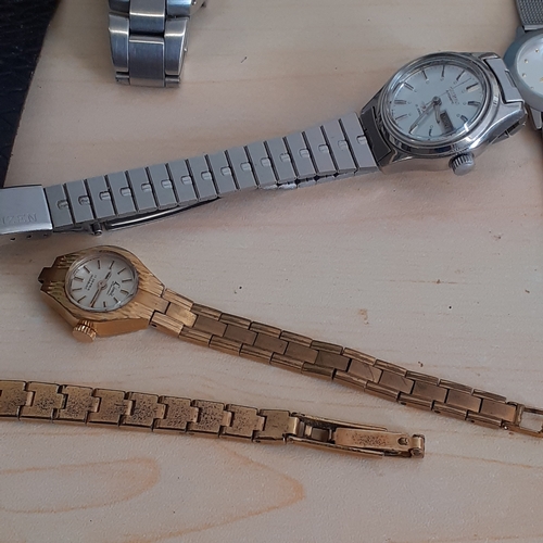 12 - Mixed watch lot. Includes playboy bunny on chain which is working and the rest are sold as spares or... 