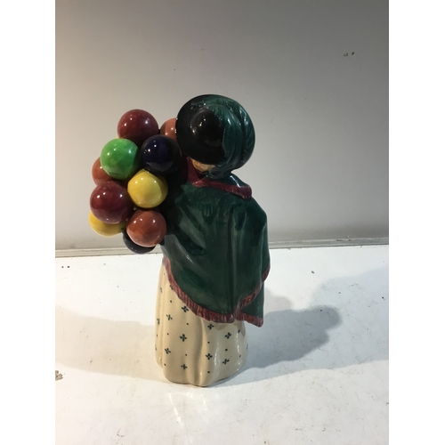 32 - Royal Doulton HN583 The balloon seller ceramic figure