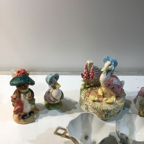 60 - Collection of Bertrix potter rabbits and musical bertrix potter duck ornament plus more