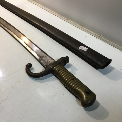 62 - Sash bayonet sword with brass handle and inscription on hilt & cover