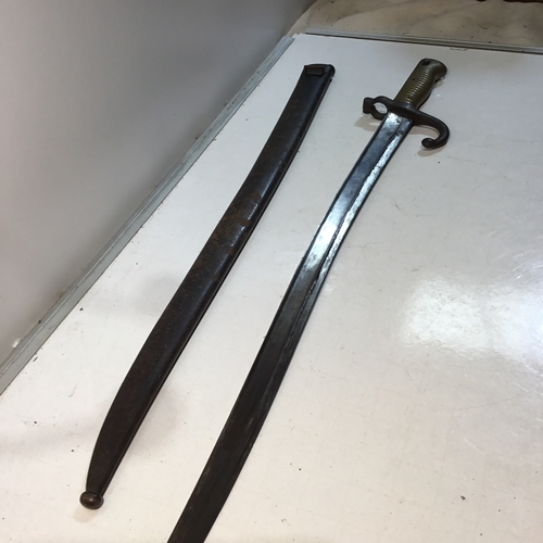 62 - Sash bayonet sword with brass handle and inscription on hilt & cover