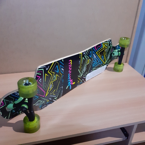 8 - Muuwmi skateboard. Light up wheels. Has been used but overall good condition and great detail