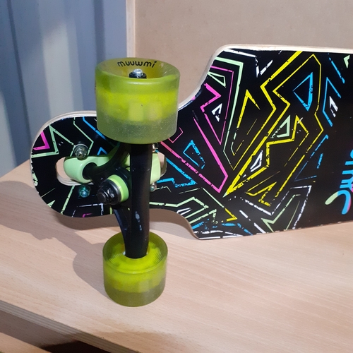 8 - Muuwmi skateboard. Light up wheels. Has been used but overall good condition and great detail