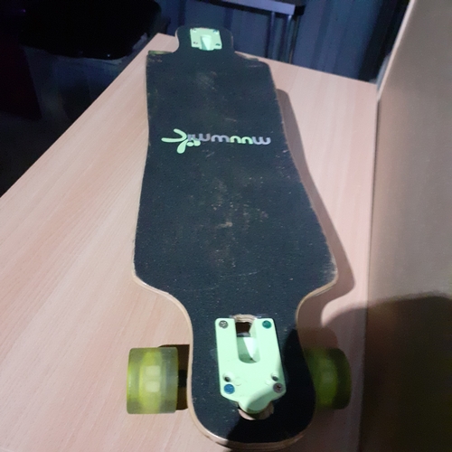 8 - Muuwmi skateboard. Light up wheels. Has been used but overall good condition and great detail