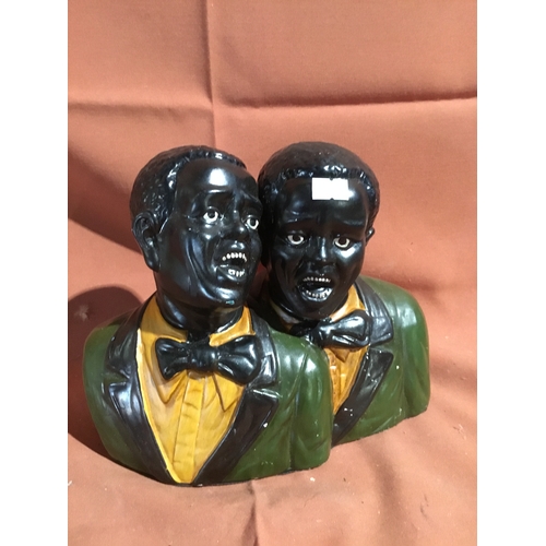 35 - Ceramic ornament of two singing men in matching suits with bow ties