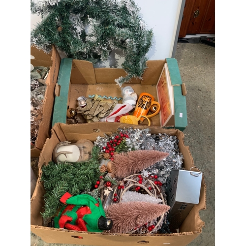 169 - Four boxes of Christmas decorations inc baubles, garland and more