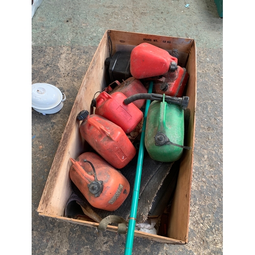 176 - Large wooden crate full of plastic & metal small Jerry cans