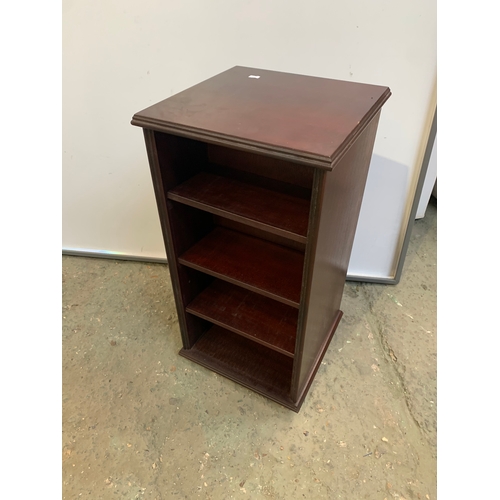 238 - Dark wood spinning cd storage rack