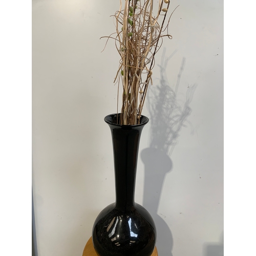 310 - Large 3ft tall black glass vase with artificial twig lights on a pine stool