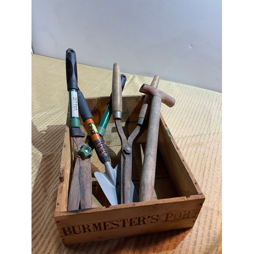 133 - Wooden Burmesters Port box with selection of hand garden tools