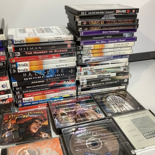 280 - Collection of pc dvd games Includes TOCA, hitman swat 3, tomb raider  & more